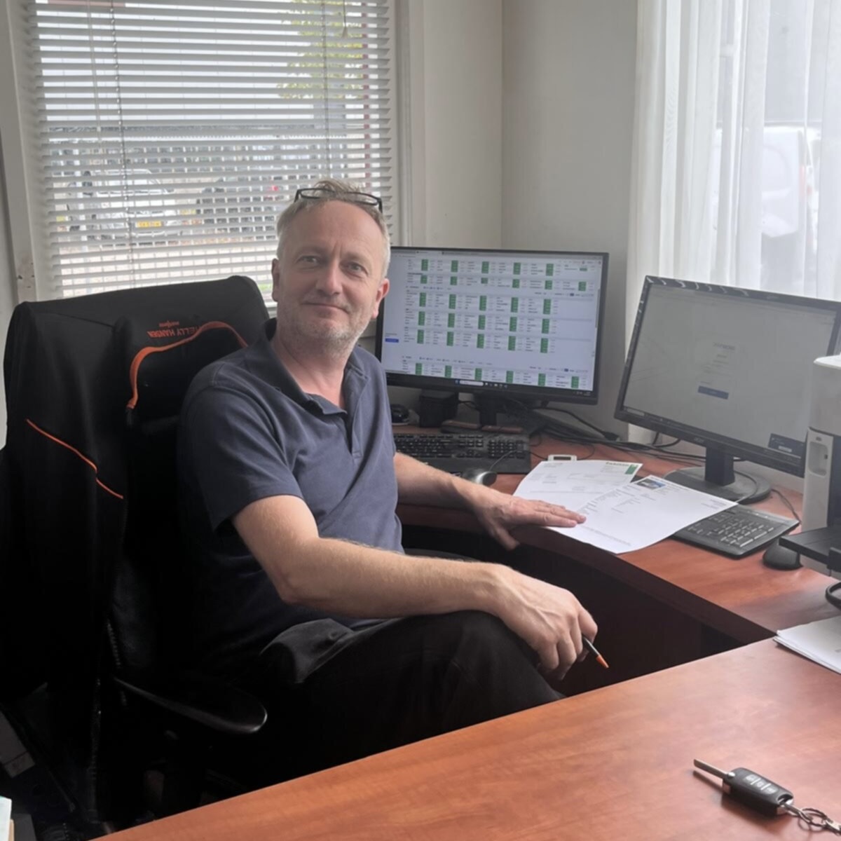 Person inspecting a car